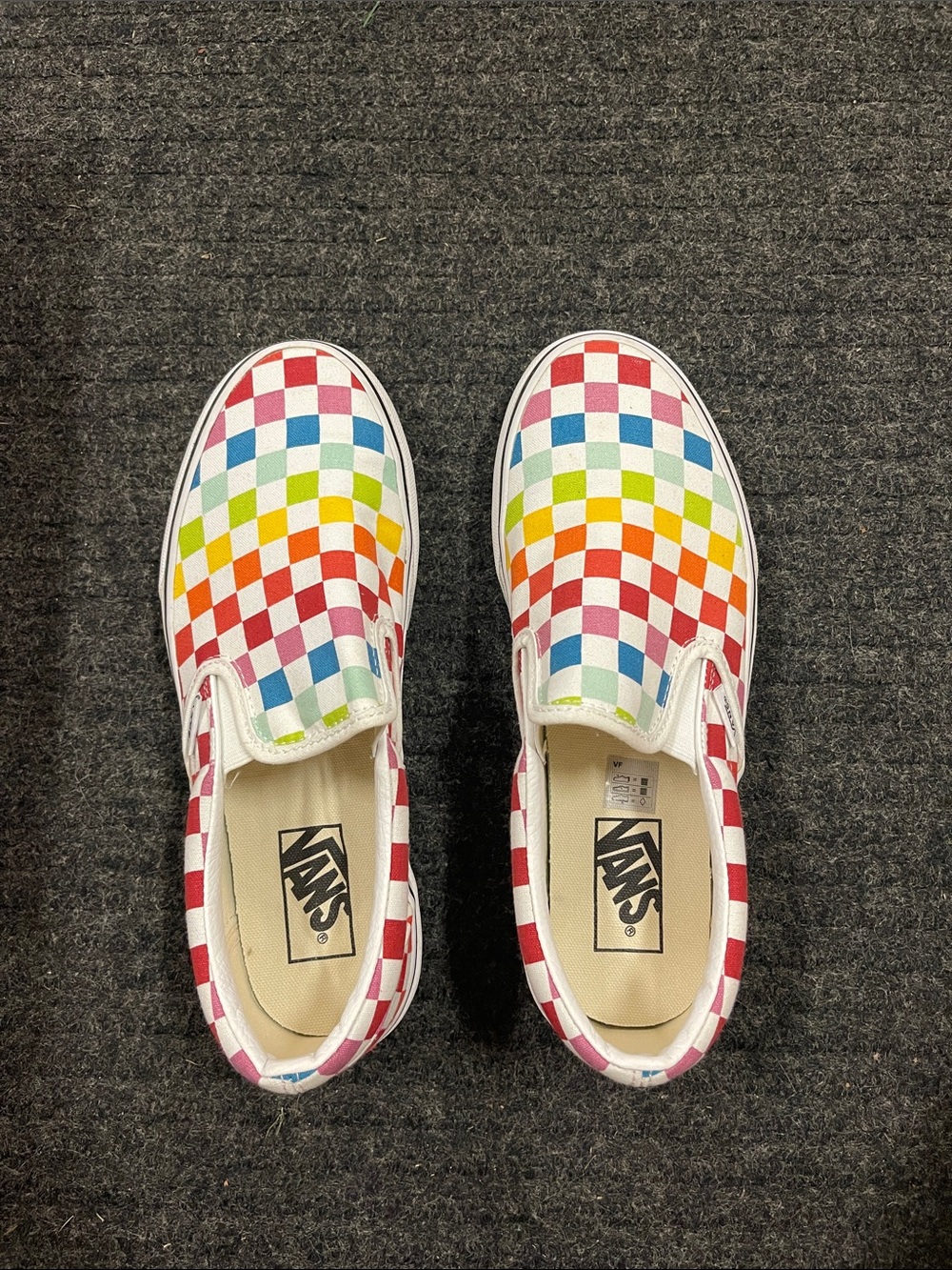 Women’s multi-color checkerboard Vans